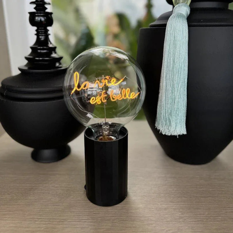 Ampoule LED design avec message lumineux la vie est belle sur socle noir, déco moderne